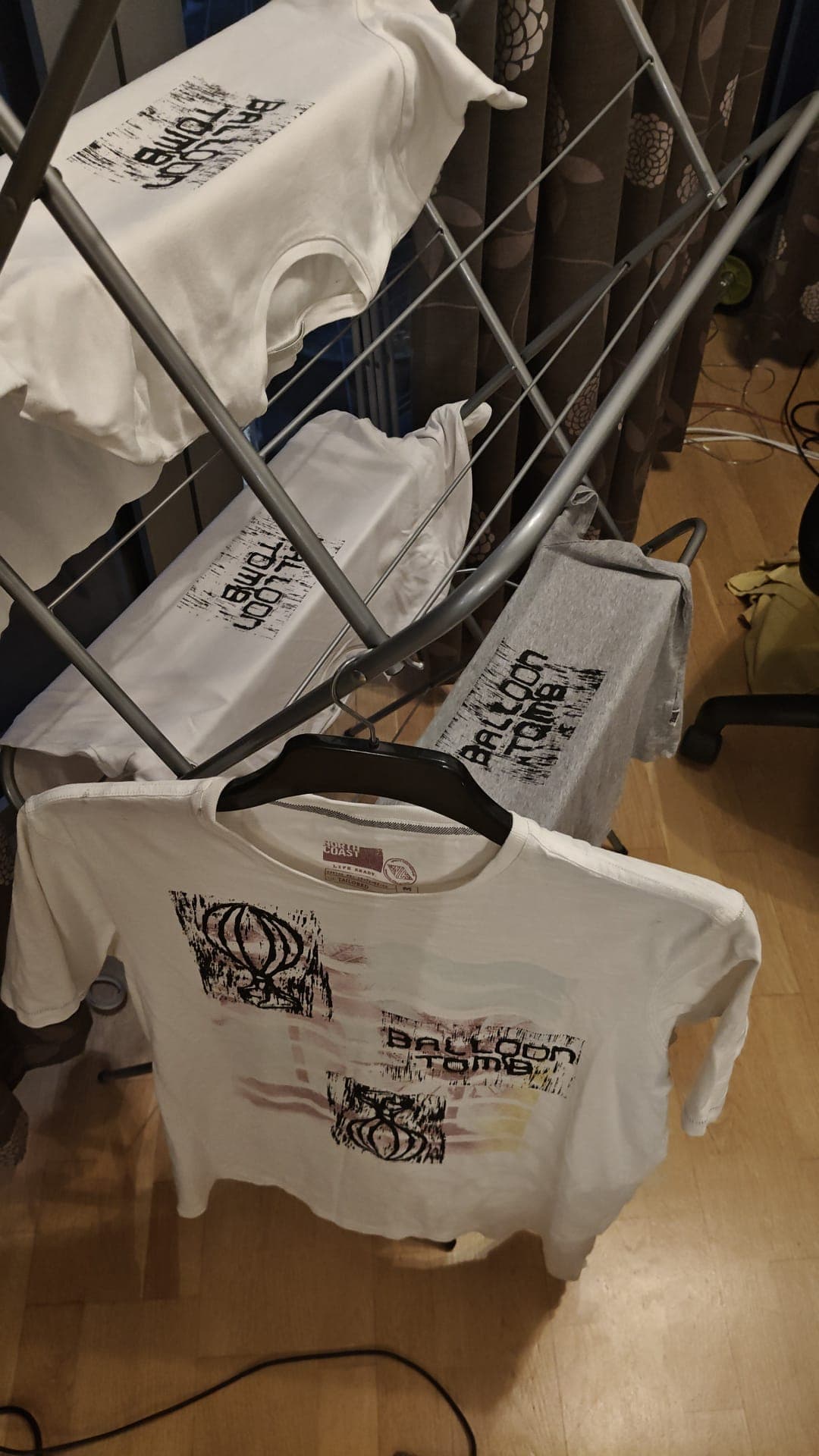 Freshly printed tees drying